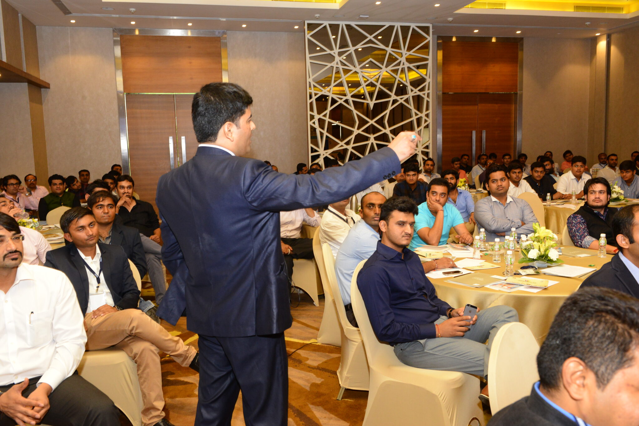 Naseer Khan conducting a high-impact training session for CREDAI professionals at a leadership event
