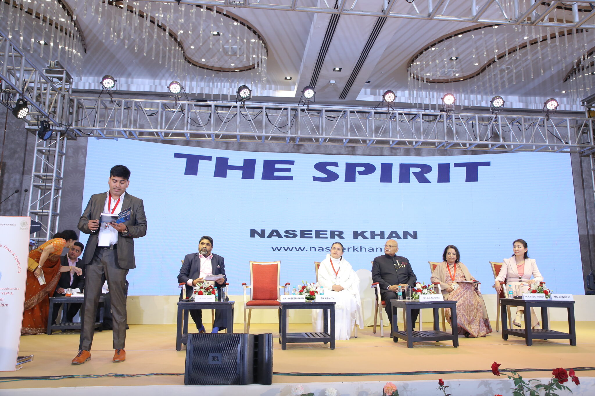 naseer khan delivering a keynote at world confluence kolkata with panel of distinguished speakers